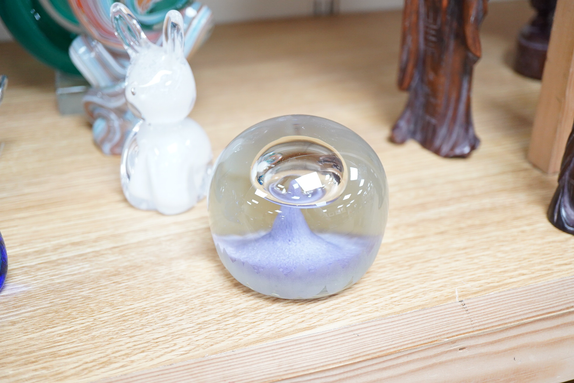 A large collection of 20th century paperweights to include Svaja, Mdina and some novelty examples in the form of animals, largest 27cm high